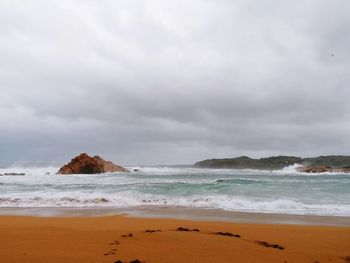 Scenic view of beach against sky