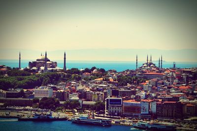 Cityscape with sea in background