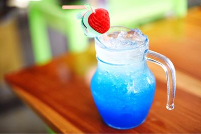 Close-up of drink served on table