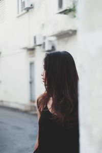 Beautiful woman standing in city