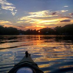 Scenic view of lake at sunset