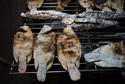 Close-up of meat on barbecue grill