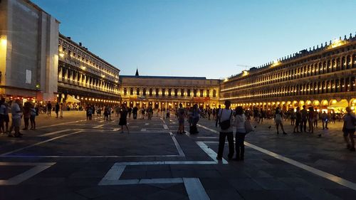 Group of people in front of building