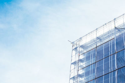 Low angle view of modern building against sky