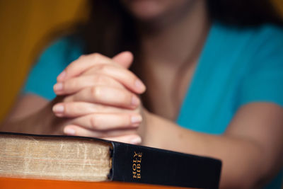 Close-up of woman holding book