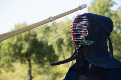 Close-up of man against sky