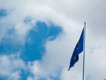 Low angle view of european union flag against sky