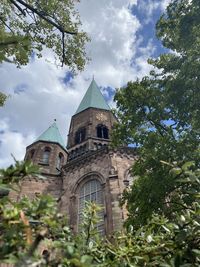 Low angle view of historic building against sky