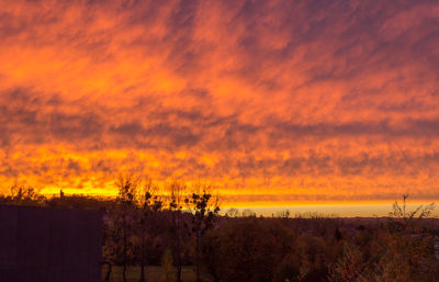 Scenic view of dramatic sky during sunset