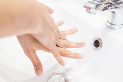 High angle view of people in bathroom