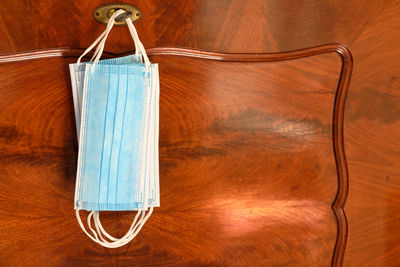 Close-up of clothes hanging on table
