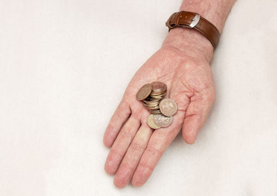 Close-up of hand holding ring