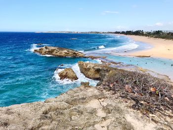 Scenic view of beach against sky