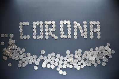 High angle view of coins on table