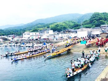 High angle view of people on boat in river