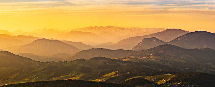 Scenic view of mountains against sky during sunset