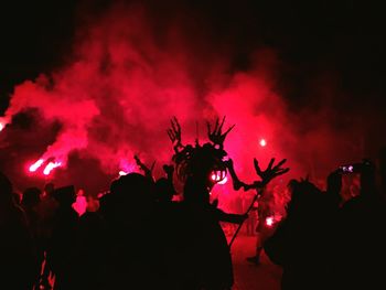 Silhouette of crowd at night