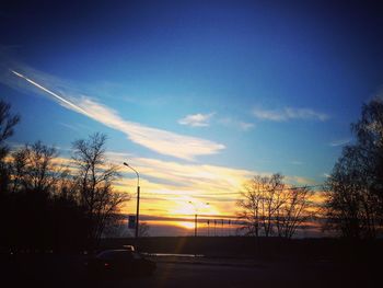 View of country road at sunset