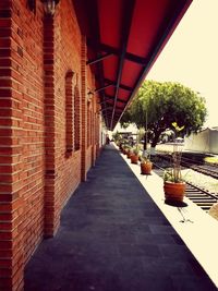 View of footpath amidst buildings