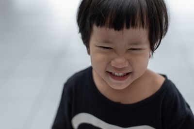 Close-up portrait of smiling boy