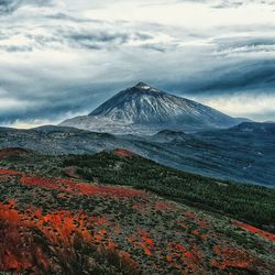 Scenic view of volcanic mountain against sky