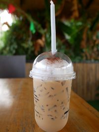 Close-up of coffee cup on table