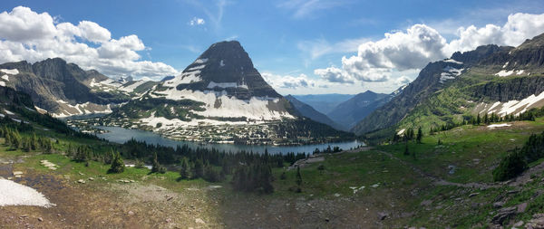 Panoramic view of lake and mountains against sky