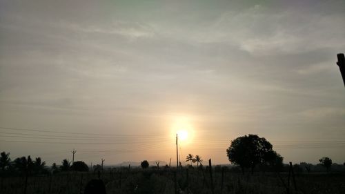 Scenic view of landscape at sunset