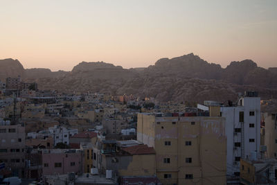 High angle view of townscape against sky during sunset