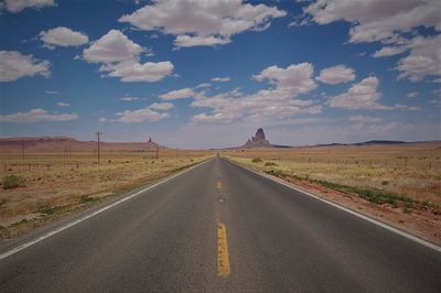 Highway by road against sky