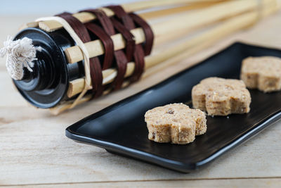 High angle view of cookies in plate on table