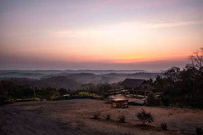 Scenic view of landscape against sky during sunset