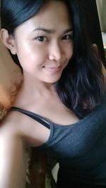 Portrait of smiling young woman