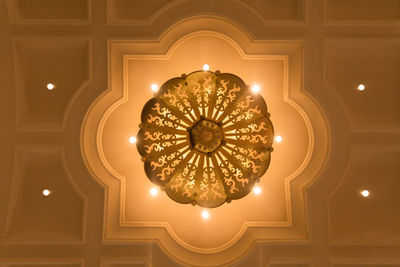 Low angle view of illuminated light bulb