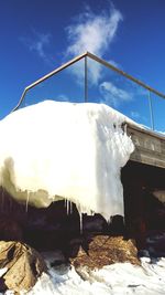 Low angle view of built structure against blue sky