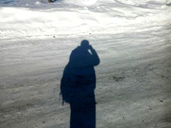 Shadow of person on snow