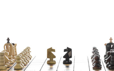 View of chess board against white background