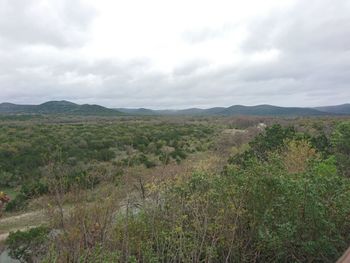 View of landscape against cloudy sky