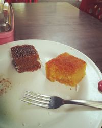 High angle view of cake in plate on table