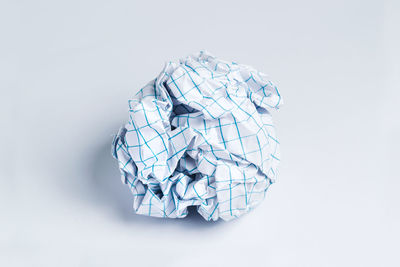 Close-up of paper decoration against white background