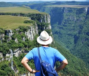 Man overlooking countryside landscape