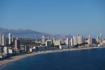 View of cityscape against clear sky