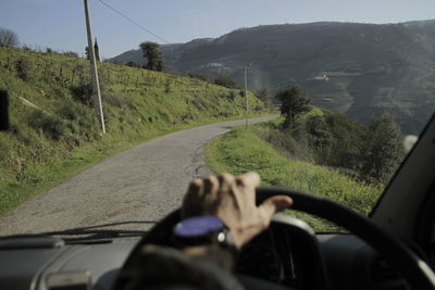 Man driving car on road