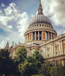 Low angle view of cathedral against cloudy sky