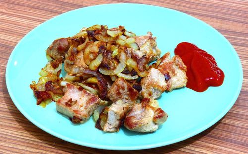 Close-up of meat in plate on table