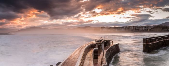 Scenic view of sea against sky during sunset