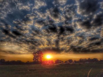 Scenic view of landscape at sunset