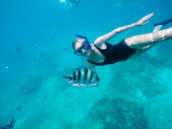 Man swimming in sea