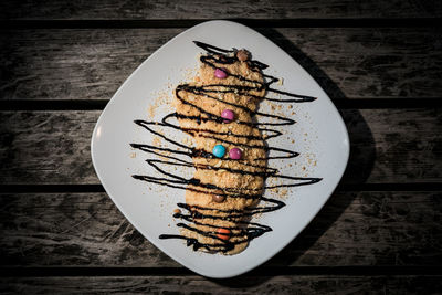 Directly above shot of cake in plate on table