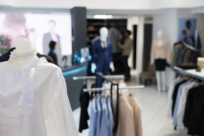 Rear view of woman standing in store